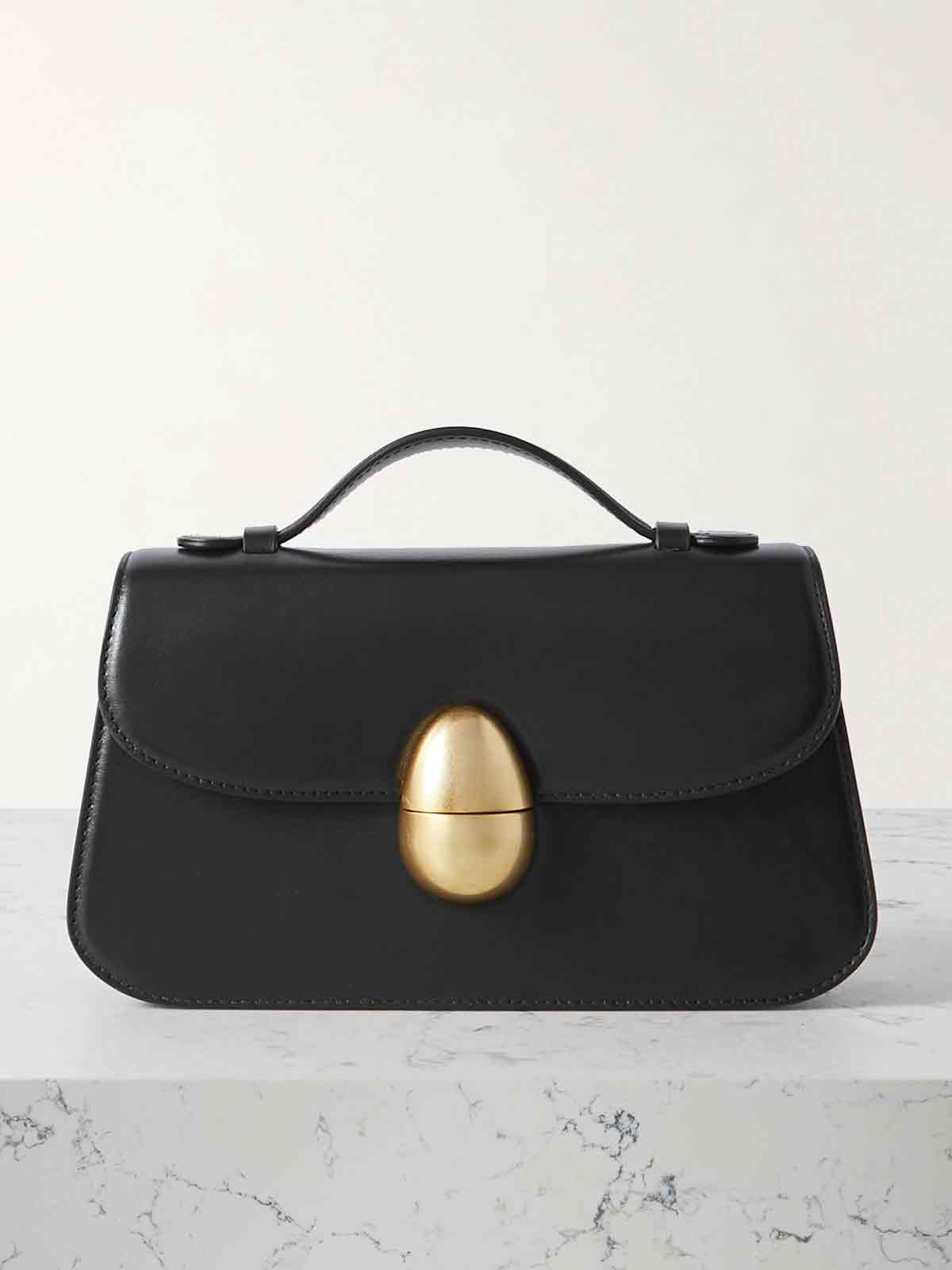 Phoenix embellished leather clutch NEOUS