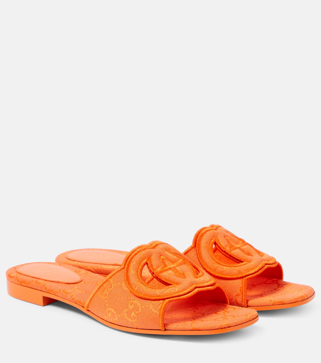 Interlocking G cutout canvas slides Gucci